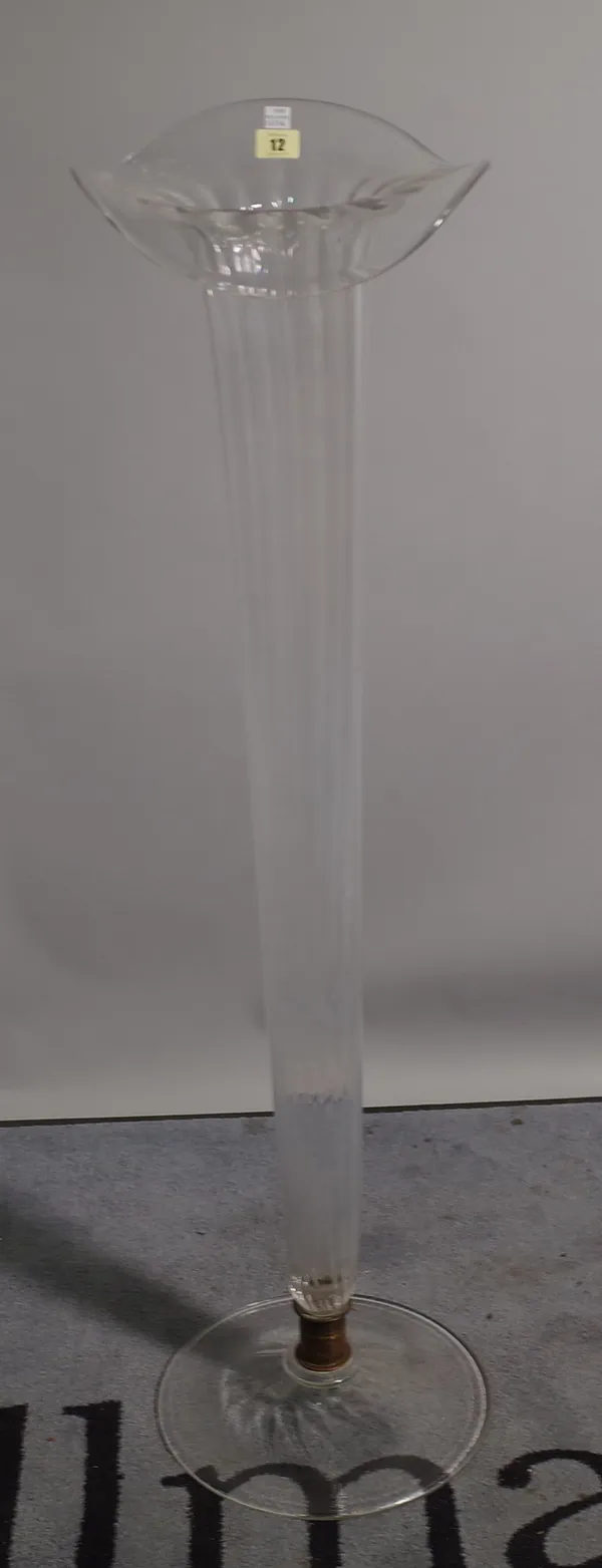 A 20th century floor standing glass vase of tapering form on a circular base, 111cm high.