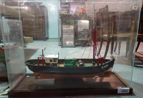 A large 20th century scratch built model of a fishing boat, in a glass case, 100cm wide x 80cm tall (a.f.).