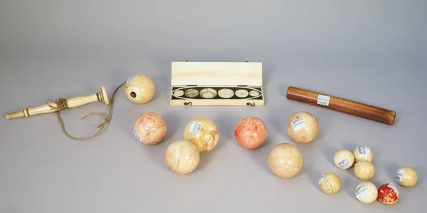 A collection of late 19th century ivory snooker balls and smaller spheres, a late 19th century carved and turned ivory toy and ivory case and sundry c