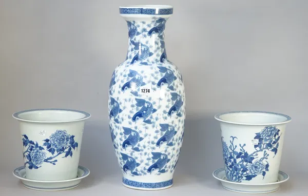 A pair of modern Chinese blue and white porcelain jardinieres and stands, 20cm high, and a modern Chinese blue and white porcelain vase decorated with