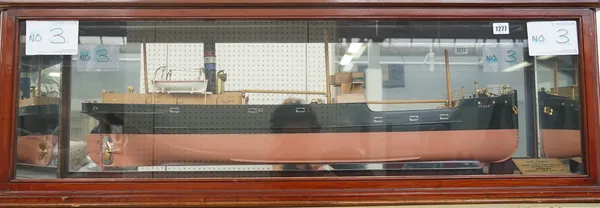 A scale model boat 'S.S. Tynan' circa. 1920, titled plaque in a glazed mahogany case, trade label to rear 'HUGH MACMILLAN' model maker, 125cm wide.