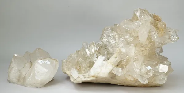 Natural history; a quartz crystal formation and another smaller, the first 45cm wide, (2).