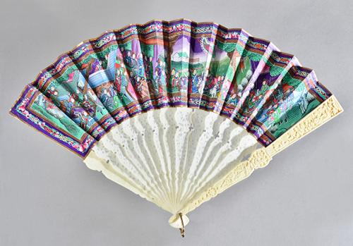 A Chinese Canton ivory fan, early 20th century, painted landscape on paper, the figures with painted ivory faces, double sided, with foliate carved an