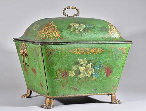A Regency tole peinte coal purdonium, foliate decorated against a green ground with gilt overlay, twin lion ring handles and four lion paw feet, 57cm