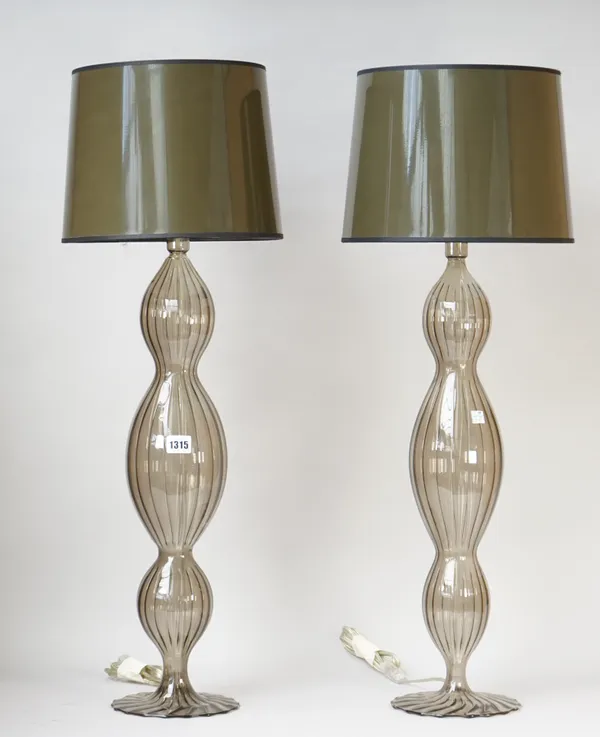 A pair of modern French glass table lamps 'Les Heritiers' of waisted spiral form with matching shades, 82cm high overall, (2).