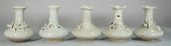 Asian ceramics, comprising; five modern crackle glaze vases with applied decoration, each 18cm tall (5).