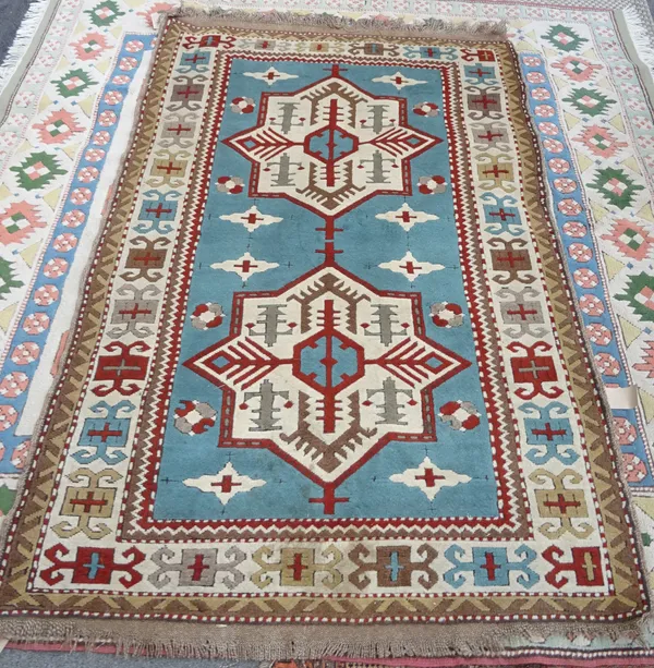 A modern Turkish rug, pale blue two medallions, of Caucasian design, 208cm x 130cm.