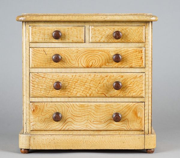 A 19th century Hungarian ash miniature chest of two short and three long graduated drawers, 35cm wide x 34cm high.