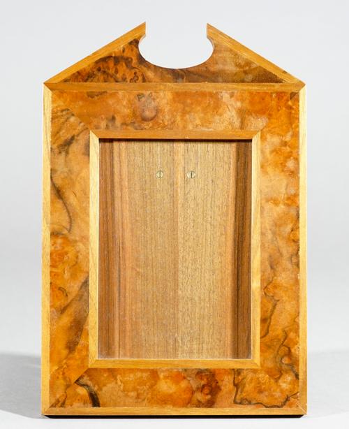 Linley; a figured walnut photo frame, with arched top, 21cm wide x 31cm high.
