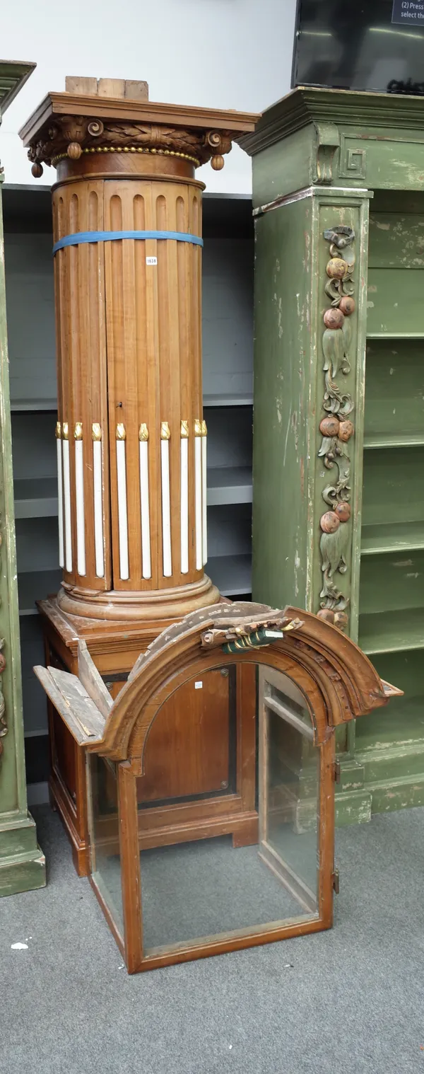 A large 19th century north European fruitwood longcase clock case with glazed arch top and fluted body, 87cm wide x 310cm high.