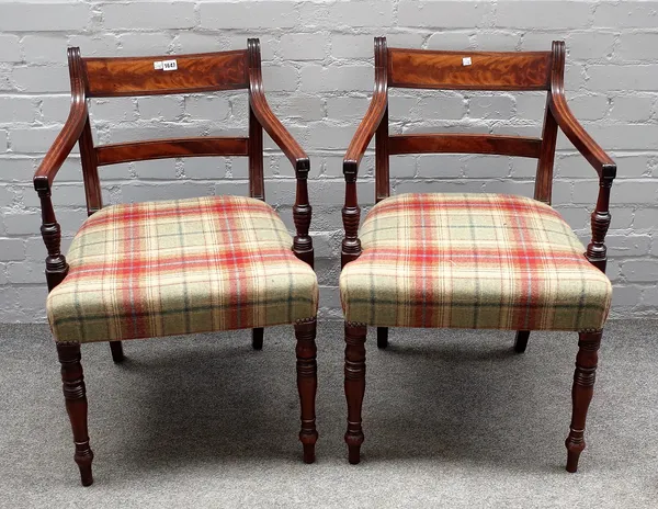 A pair of George IV inlaid mahogany carver chairs on turned supports, 55cm wide x 84cm high.