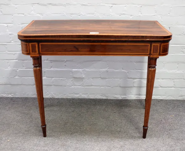 A George III rosewood card table, with satinwood crossbanded top, on box strung tapering legs, 91cm wide x 71cm high.