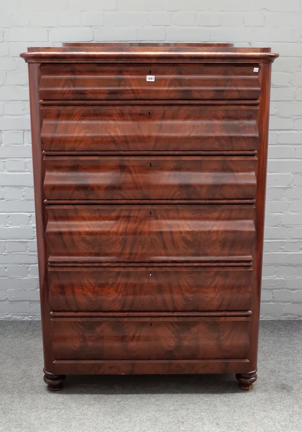 A 19th century French mahogany tall chest of six shaped drawers, 107cm wide x 159cm high x 55cm deep.