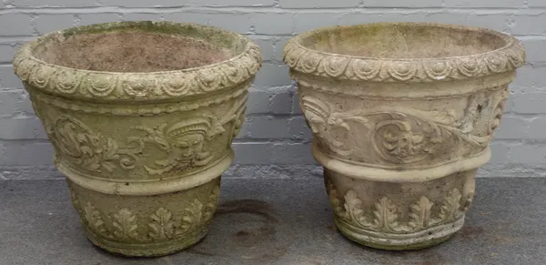 A pair of conical reconstituted stone jardinieres, with egg and dart rim and scroll body, 57cm wide x 48cm high, (2).