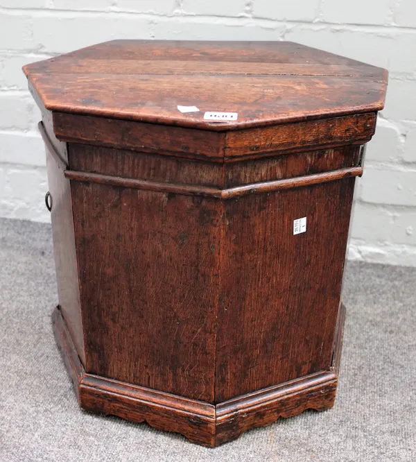 A mid-18th century oak octagonal wine cooler, later converted, 48cm wide x 41cm high.