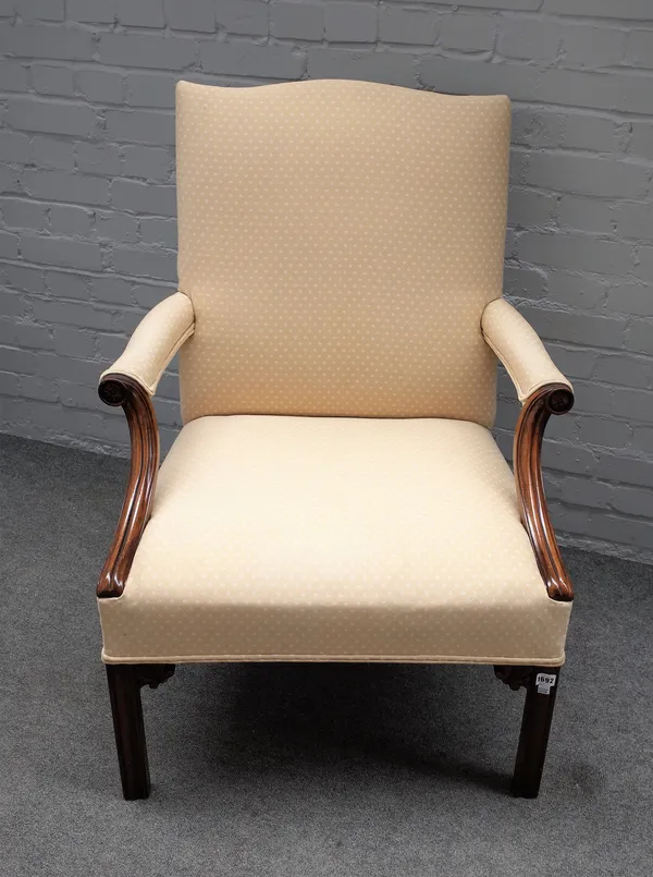 A George III style Gainsborough armchair, on block mahogany supports, 76cm wide x 101cm high.