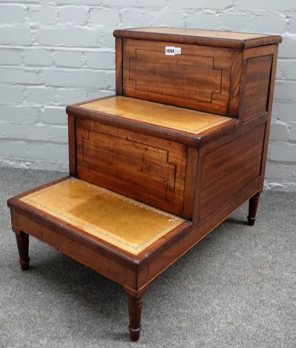 A set of George III mahogany three tier bed steps, on turned supports, 64cm wide x 60cm high.