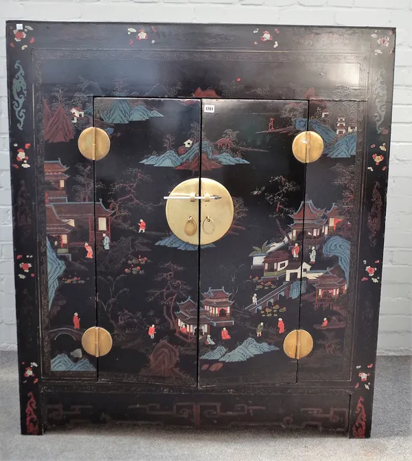 An early 20th century Eastern black lacquer polychrome painted two door side cabinet, 122cm wide x 140cm high.