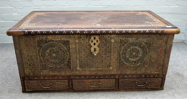 A 19th century brass bound and moulded teak Zanzibar trunk, the lift top over three drawers, 103cm wide x 46cm high.