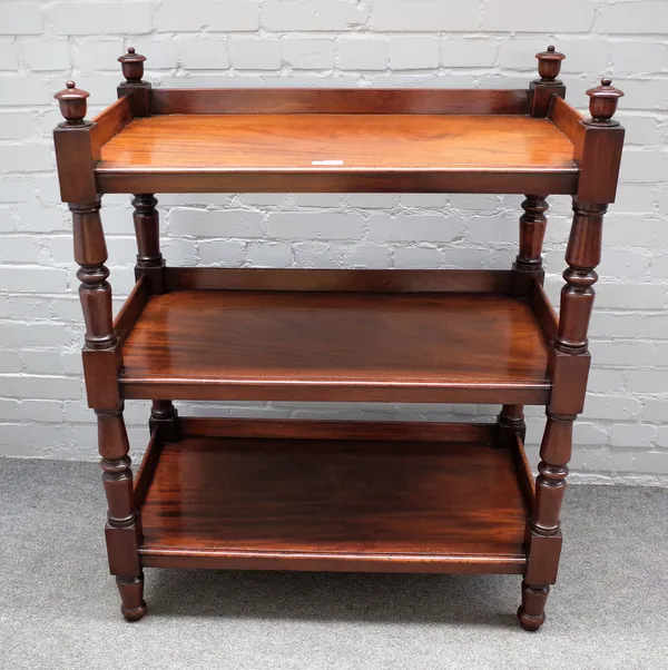 An early Victorian mahogany three tier buffet, on turned supports, 91cm wide x 113cm high.