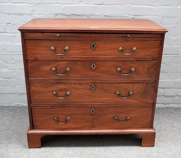 A George III mahogany chest, the brushing slide over four long graduated drawers, 86cm wide x 80cm high.