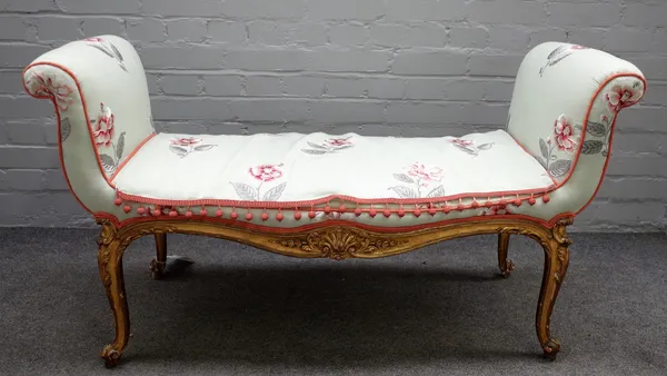 A George III giltwood window seat, with floral needlework upholstery, 118cm wide.