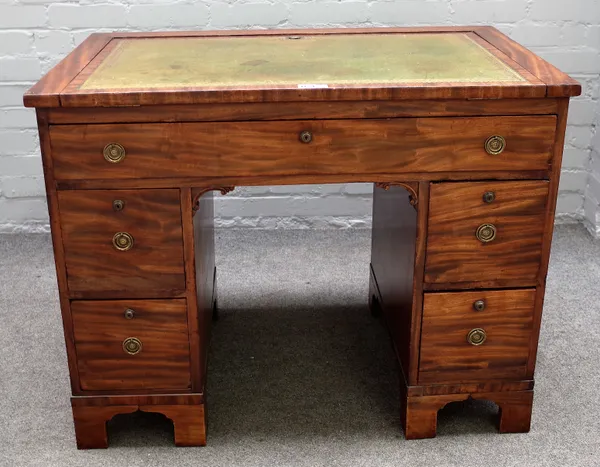 A George III and later mahogany writing desk, the angle adjustment top over five drawers, on bracket feet, 94cm wide x 75cm high.