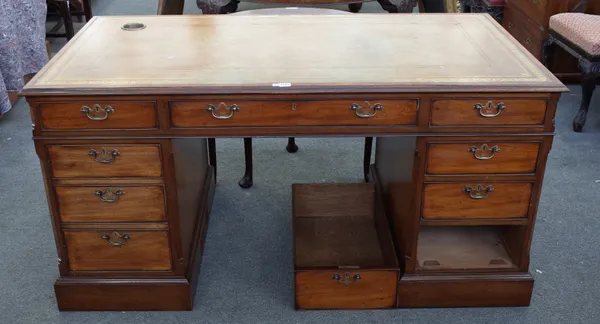 ARTHUR BRETT; an 18th century style mahogany pedestal desk with six drawers and cupboard about the knee, 153cm wide x 81cm deep.