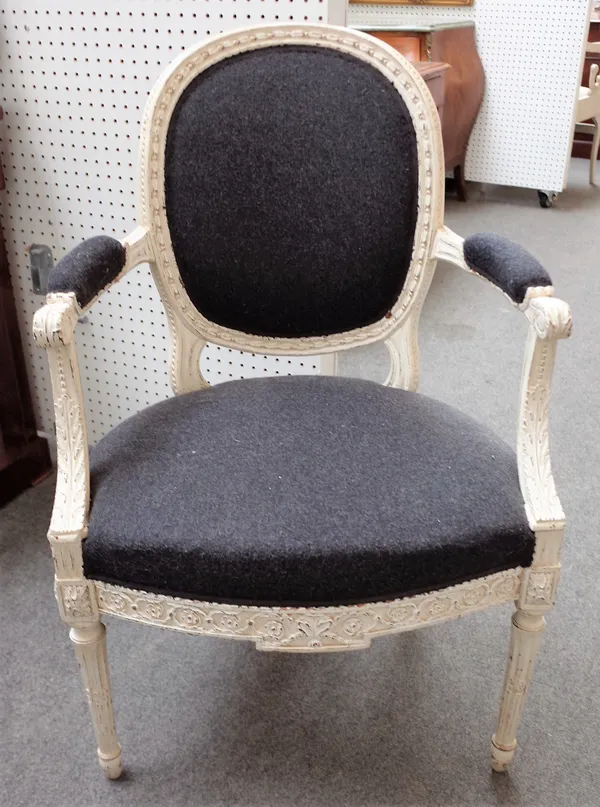 A Louis XVI later white painted open armchair /  fauteuil with bow seat on tapering fluted supports, 63cm wide x 98cm high. 5012