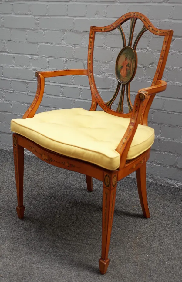 An Edwardian polychrome painted satinwood open armchair, on tapering square supports, 55cm wide x 92cm high.