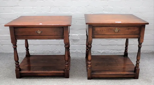 A pair of 17th century style oak two tier single drawer side tables on baluster supports, 58cm wide x 61cm high.