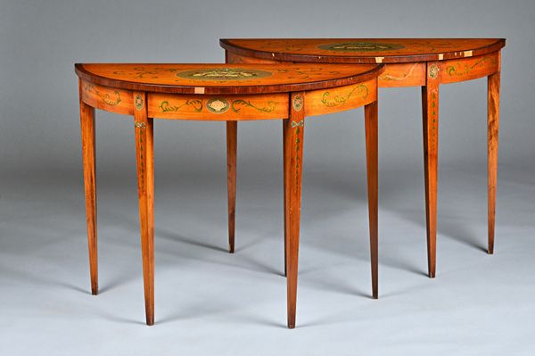 A pair of George III style polychrome painted rosewood demi-lune side tables on tapering square supports, each 101cm wide x 78cm high.