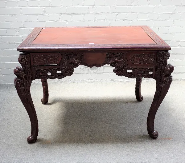 A 20th century Eastern carved hardwood rectangular centre table with a pair of frieze drawers, 107cm wide x 77cm high.