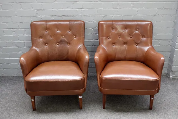 A pair of 20th century brown leatherette upholstered tub back easy armchairs on tapering beech supports, 71cm wide x 78cm high.