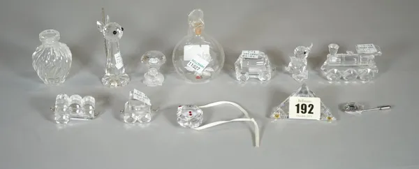 Glassware, including; a Lalique vase, 6cm high, a glass snuff bottle and six Swarovski figures, including, a duck, a toadstool,  cat, a pin, a Christm