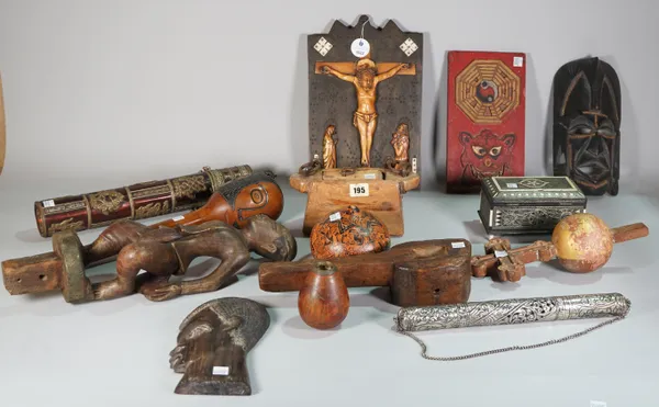 Tribal interest, a quantity of mostly 20th century hardwood figures, a club, two masks and sundry, (qty).