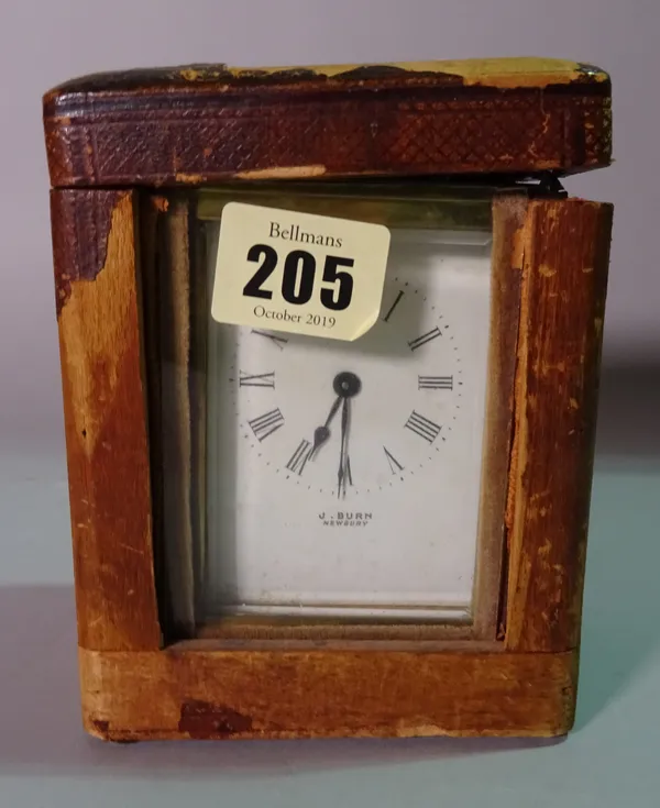 A 19th century brass cased carriage clock by 'J.BURN' in a leather case, 10cm wide x 15cm tall.