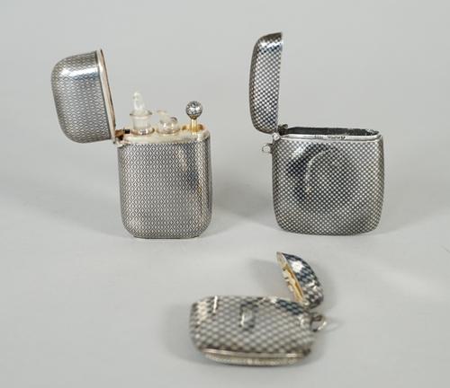 A silver and niello decorated rectangular vesta case, decorated in a chequer board design, import mark Birmingham 1904, a European niello decorated cu