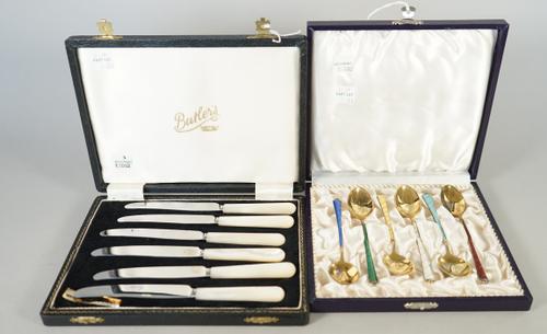 A set of six Danish silver gilt and varicoloured enamel teaspoons, the tapered stems with spiral decoration, detailed Ela Denmark Sterling 925 S, case