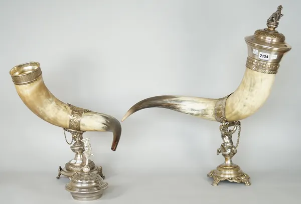 A silver plated metal mounted horn cornucopia, the detachable cover with a finial formed as Mercury and another silver plated metal mounted horn cornu