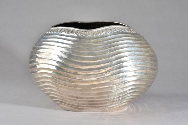 A European bowl, probably Turkish, of oval form with wavy fluted decoration within a decorated rim, detailed 900 GS, height 18.5cm, weight 1115 gms.