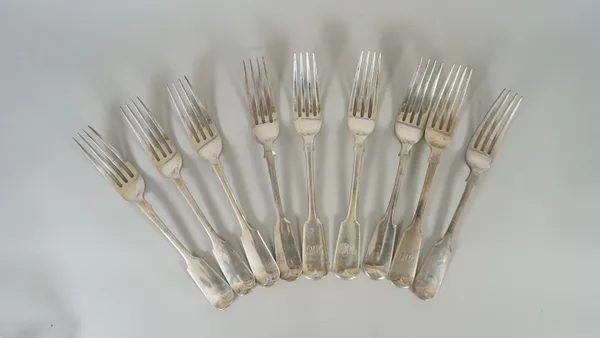 Nine silver fiddle pattern table forks, comprising; five London 1861, one London 1853 and three London 1896, combined weight 669 gms, (9).