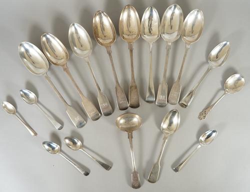 Silver table flatware, comprising; seven fiddle pattern tablespoons, one Old English pattern tablespoon, two dessert spoons, five teaspoons, a sauce l