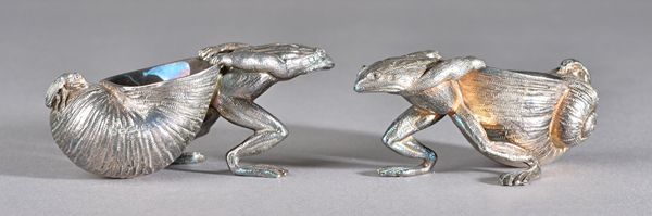 A pair of silver salts, each modelled as a frog pulling a large snail, with an insect, length 10cm, maker Francis Howard Ltd, modern, combined weight