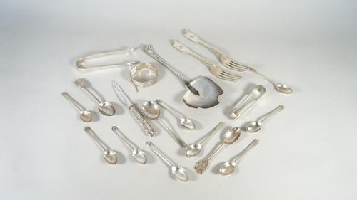 Silver, comprising; two pairs of sugar tongs, two fiddle pattern table forks, London 1832, a shooting spoon, a fiddle pattern teaspoon, nine golfing t