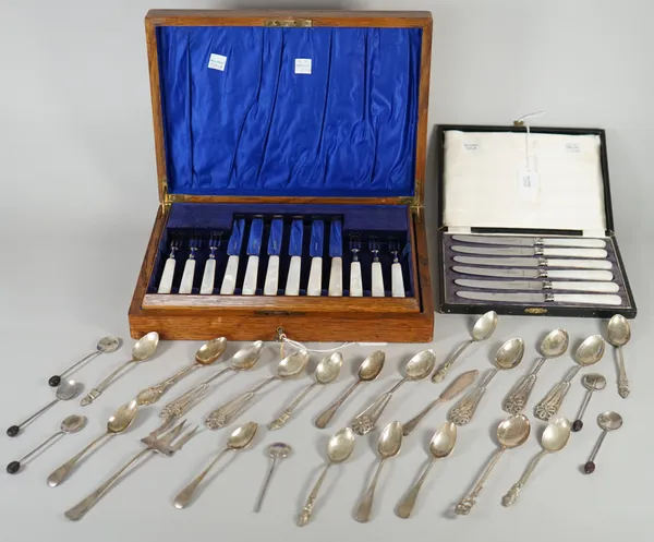 Silver flatware, comprising; a sardine fork, a butter knife, a shooting spoon, five teaspoons and six coffee spoons, combined gross weight 167 gms, fo