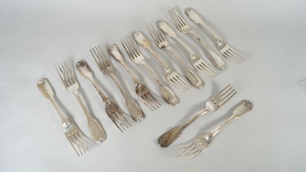 Thirteen silver double struck fiddle and thread pattern table forks, mixed dates, some crest engraved, weight 1163 gms, (13).