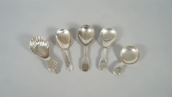 A George III silver caddy spoon, having a scalloped bowl and a trefoil motif to the handle, Sheffield 1802, a Victorian silver fiddle pattern caddy sp