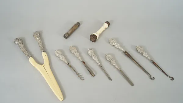 A silver mounted tortoiseshell page turner, London 1903, with a case, a silver lipstick holder, London 1949, a steel twin ended seal, with a turned iv