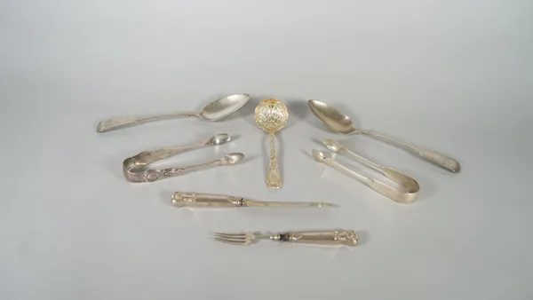 Silver flatware, comprising; a pair of fiddle pattern tablespoons, London 1828, two pairs of sugar tongs, a gilt sugar sifting spoon, with later decor